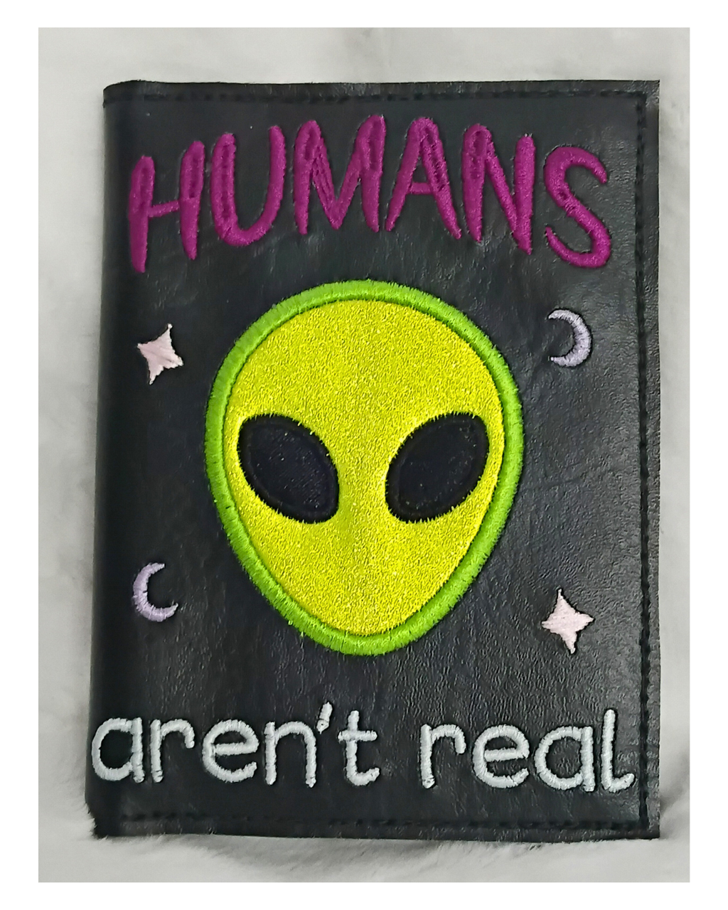 Humans Aren't Real - A6 Notebook