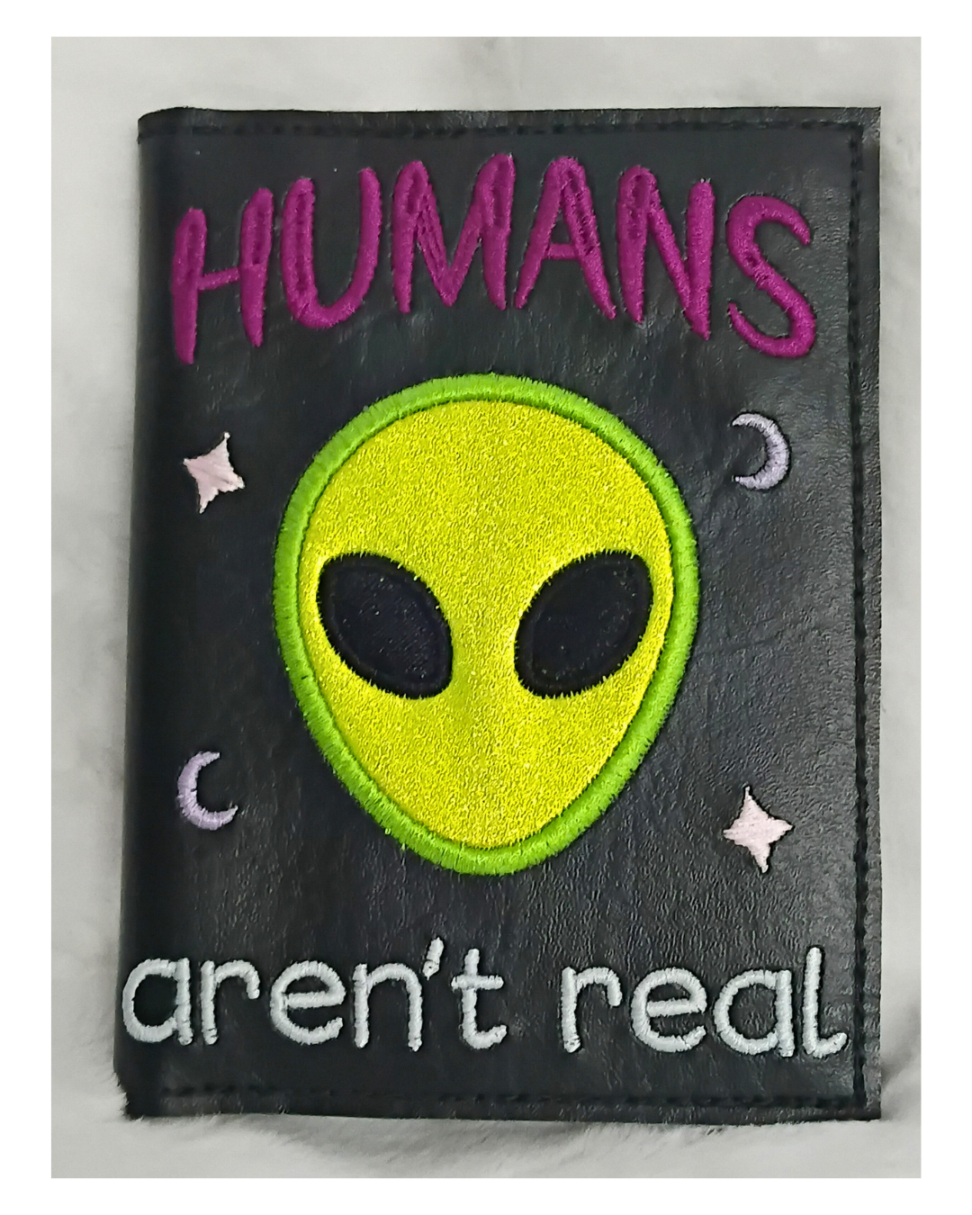 Humans Aren't Real - A6 Notebook